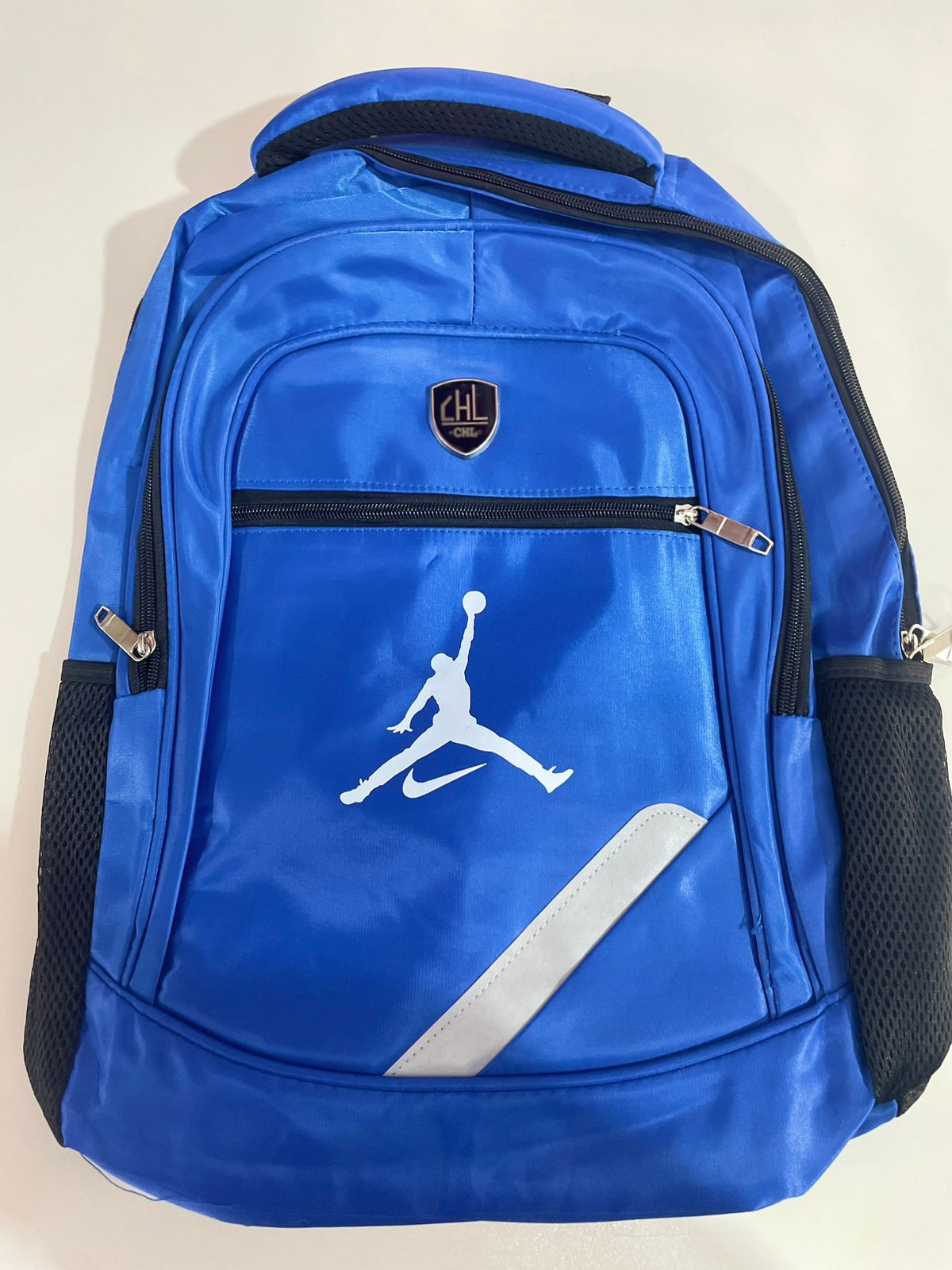 mochila nike azul 40 cm por 30 cm